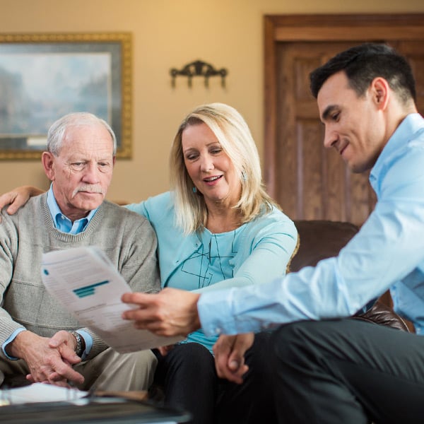 Honor professional discusses care options with aging man and his daughter